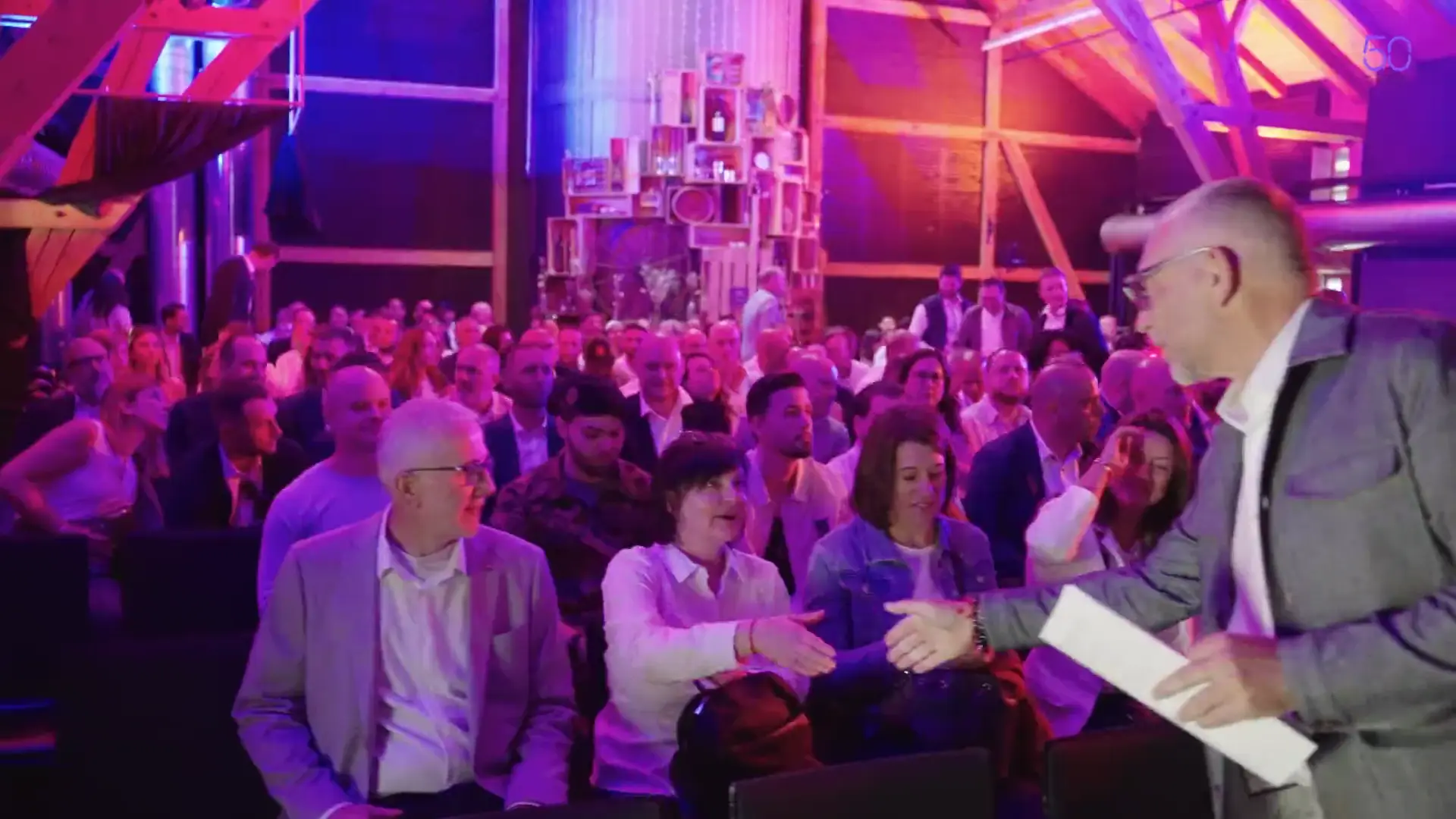 Collaborateurs en plénière lors du jubilé des 50 ans de Protectas, événement d'entreprise produit par Moon Suisse